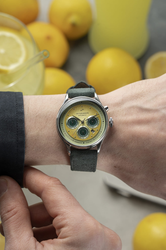 About Vintage 1564 Chronodate Automatic, Steel/Limoncello Limited